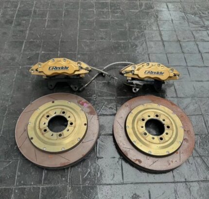 Original Greddy brake 6 Pot with 355 Rotor.