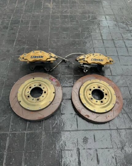 Original Greddy brake 6 Pot with 355 Rotor.